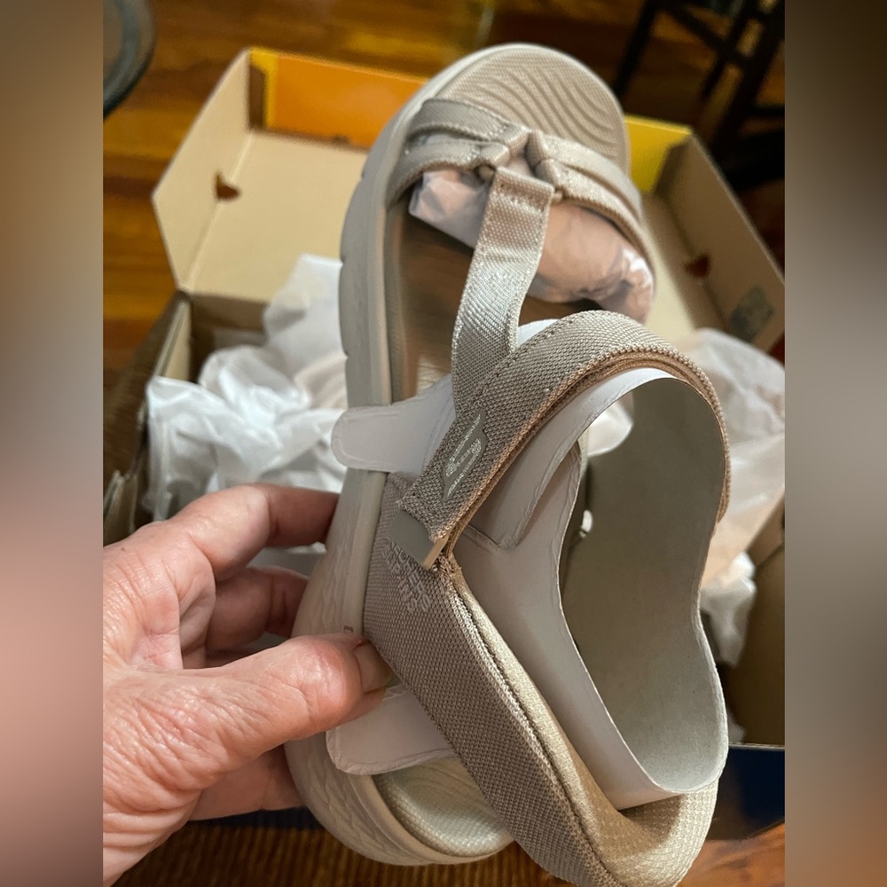 Women’s Skechers beige size 10 slip-in canvas sandal. Never worn
